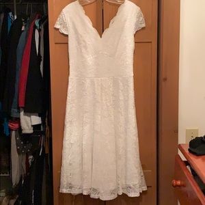 Knee length, white lace dress